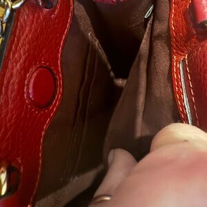 Red Leather Bag with Textured Surface